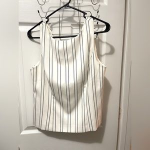 Work top, high neck, V back with zipper.